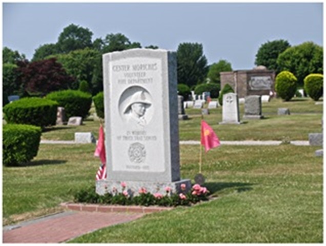 cemetery monument fireman carving